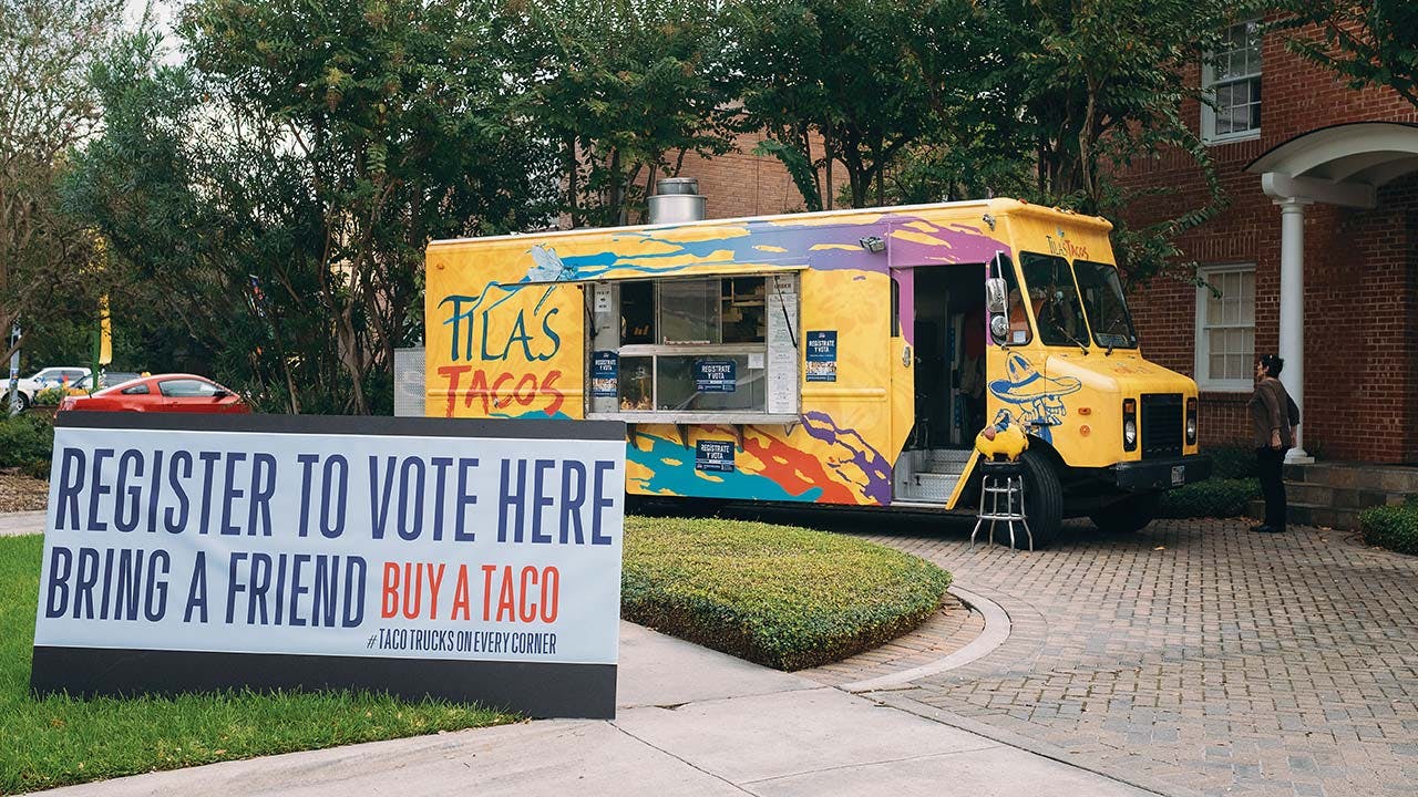 Tila’s Tacos, parked next to Rice University, participating in a citywide food truck voter registration drive.