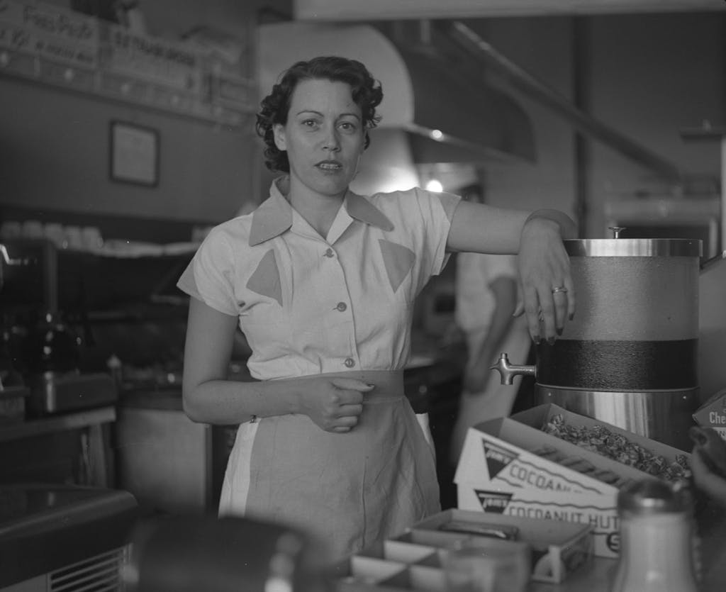 Waitress at Ernie’s Hamburger Stand in Fort Worth. Taken by Byrd William III, 1955.