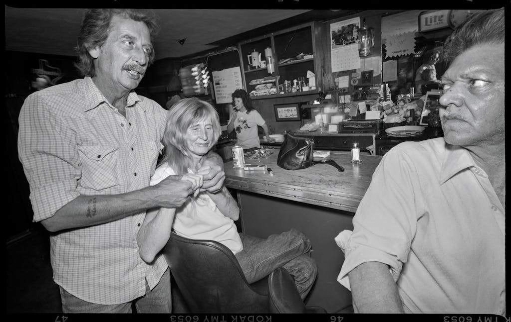 Disagreement at Brims Tavern on Riverside Drive in Fort Worth. Photograph by Byrd Williams IV, 1986.
