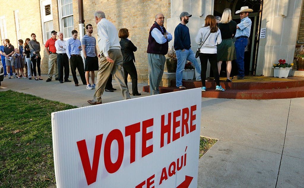Voters line up to cast their ballots on Super Tuesday March 1, 2016 in Fort Worth, Texas.