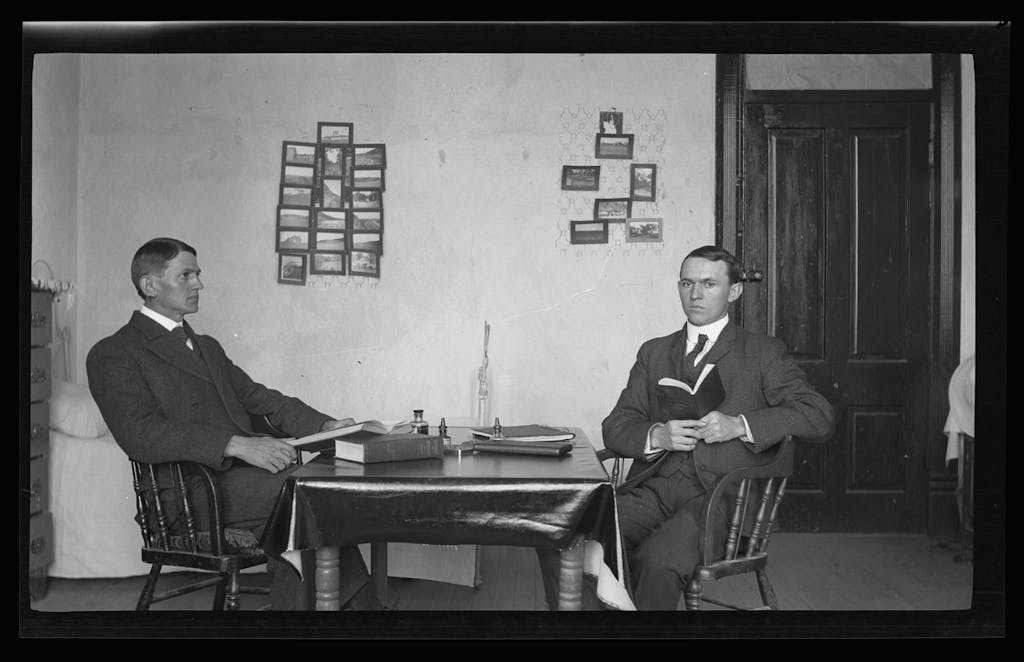 Byrd William II and his brother Johnson exhibit their photographs in B Hall at the University of Texas in Austin. Taken by Byrd Williams, circa 1906.