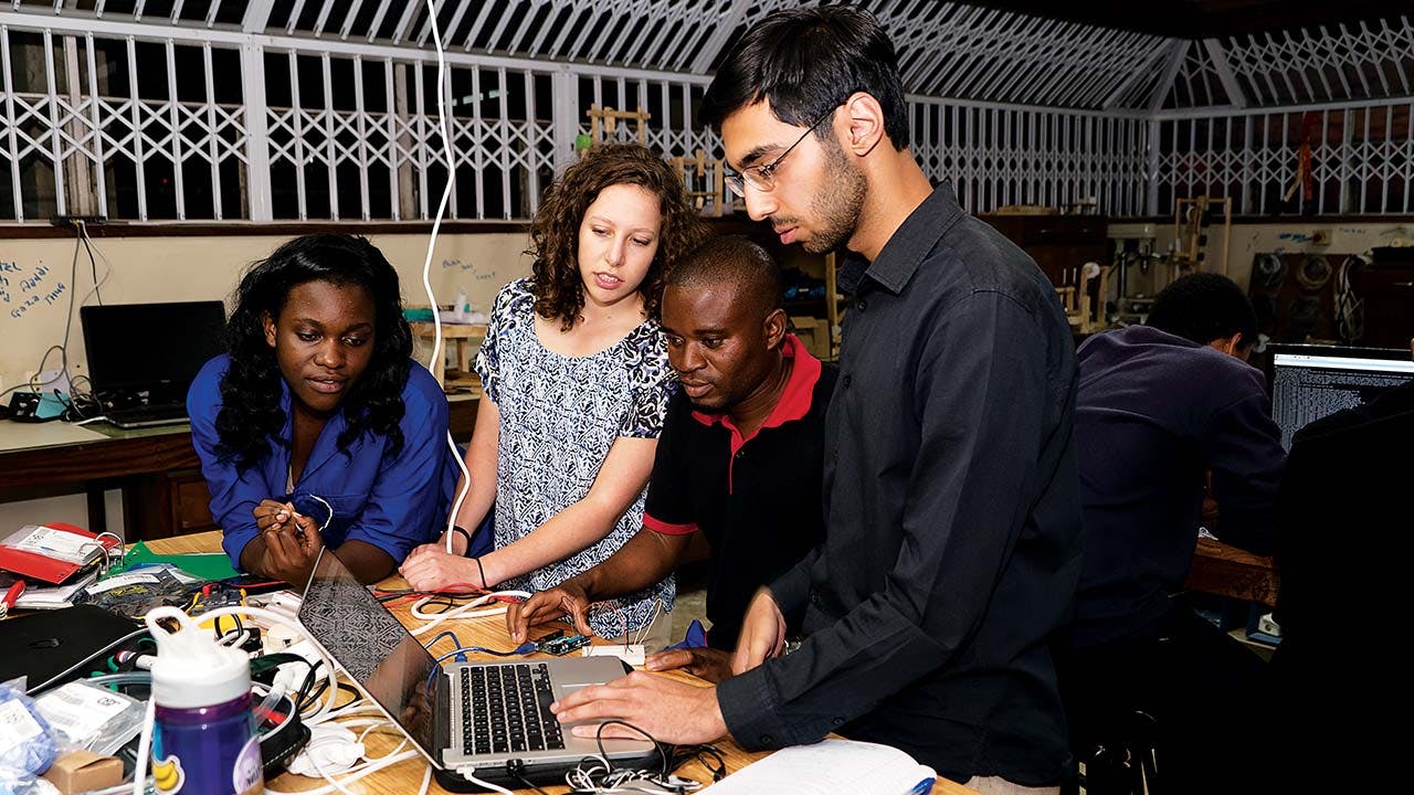 Students from Rice and the University of Malawi Polytechnic working together in Malawi in June 2016.