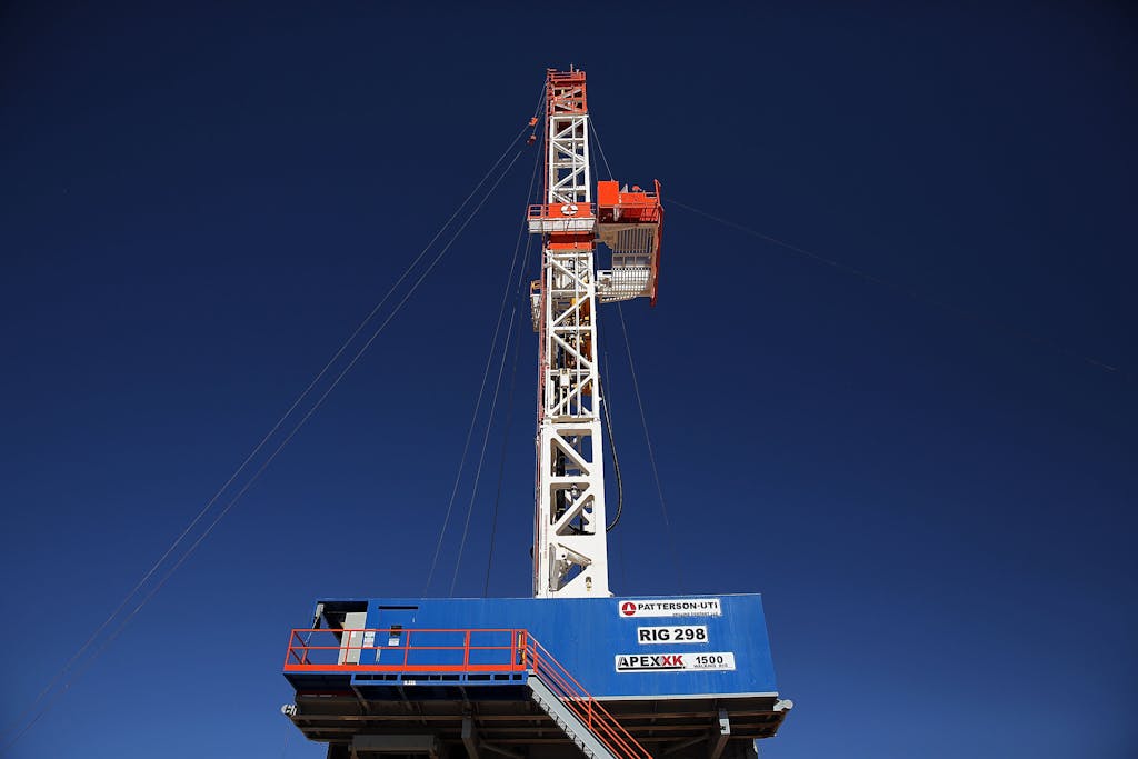 MENTONE, TX - FEBRUARY 05: The Patterson 298 natural gas fueled drilling rig drills on land in the Permian Basin that is owned by Apache Corporation on February 5, 2015 in Mentone, Texas.The rig, which is only 21 days old, is the first drilling rig in Texas that is 100-percent fueled by natural gas. As crude oil prices have fallen nearly 60 percent globally, many American communities that became dependent on oil revenue are preparing for hard times. Texas, which benefited from hydraulic fracturing and the shale drilling revolution, tripled its production of oil in the last five years. The Texan economy saw hundreds of billions of dollars come into the state before the global plunge in prices. Across the state drilling budgets are being slashed and companies are notifying workers of upcoming layoffs. According to federal labor statistics, around 300,000 people work in the Texas oil and gas industry, 50 percent more than four years ago. (Photo by Spencer Platt/Getty Images)