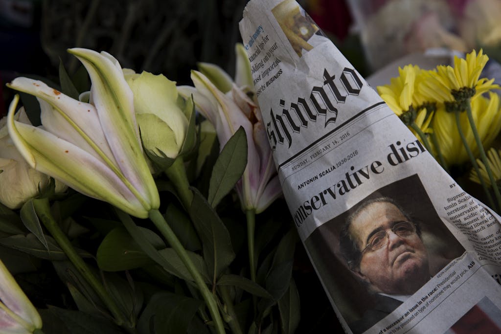 WASHINGTON, DC - FEBRUARY 14: A makeshift memorial for Supreme Court Justice Antonin Scalia is seen at the U.S. Supreme Court, February 14, 2016 in Washington, DC. Supreme Court Justice Antonin Scalia was at a Texas Ranch Saturday morning when he died at the age of 79. (Photo by Drew Angerer/Getty Images)