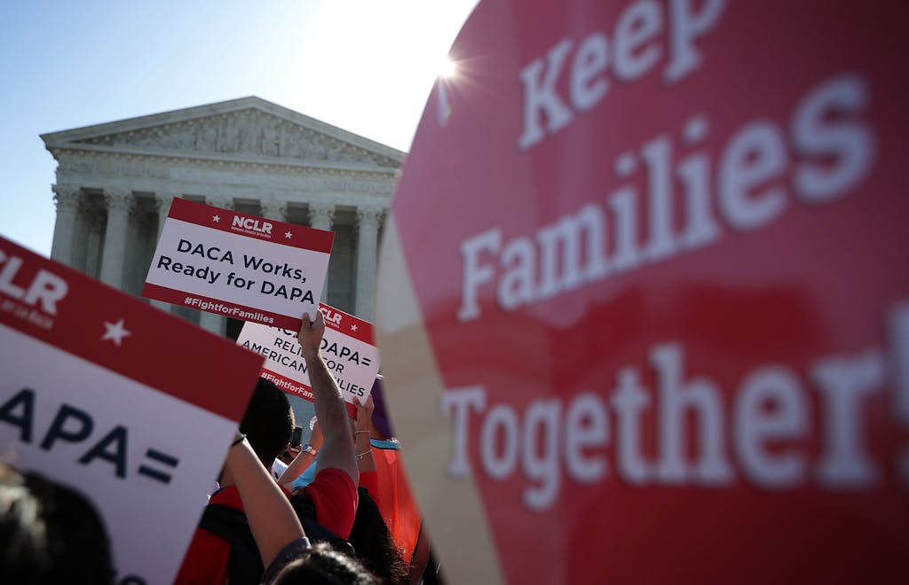 WASHINGTON, DC - APRIL 18: Pro-immigration activists gather in front of the U.S. Supreme Court on April 18, 2016 in Washington, DC. The Supreme Court is scheduled to hear oral arguments in the case of United States v. Texas, which is challenging President Obama's 2014 executive actions on immigration - the Deferred Action for Childhood Arrivals (DACA) and Deferred Action for Parents of Americans and Lawful Permanent Residents (DAPA) programs. (Photo by Alex Wong/Getty Images)
