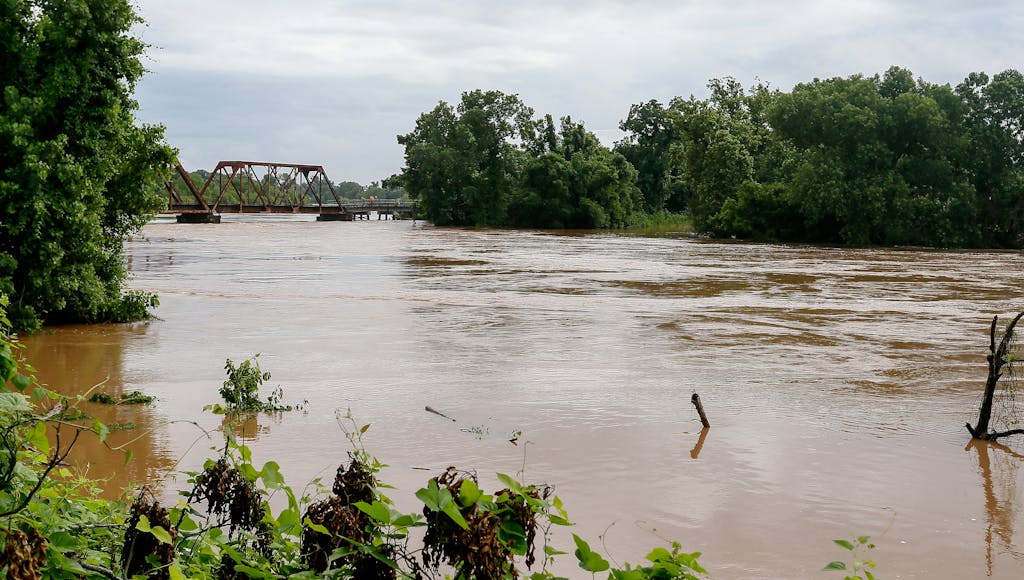 RICHMOND, TX - JUNE 03: The Brazos River is seen at a high level after heavy rainfall has brought flooding to the area on June 3, 2016 in Richmond, Texas. The Brazos River reached a record level on Thursday climbing above 54 feet. (Photo by Bob Levey/Getty Images)