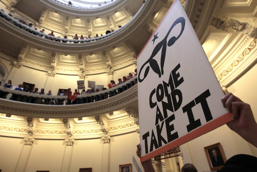 Supporters of Texas women's right to reproductive decisions rally at the Texas State capitol on July 1, 2013 in Austin, Texas. 