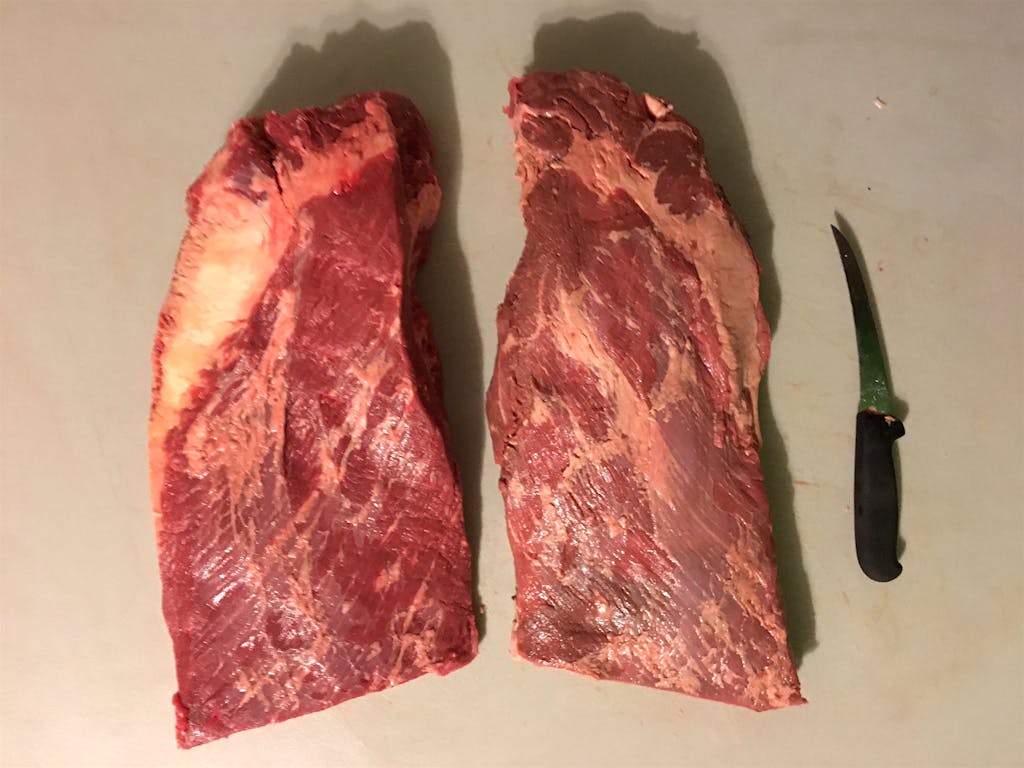 Comparison photograph of Fresh brisket and a year-old brisket. 