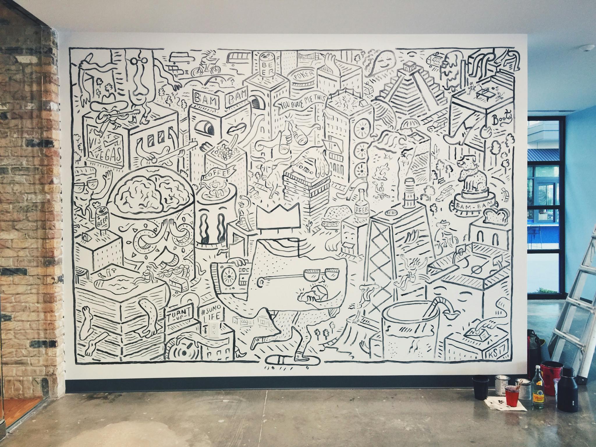 Wall art of Kyle Steed's professional doodling.