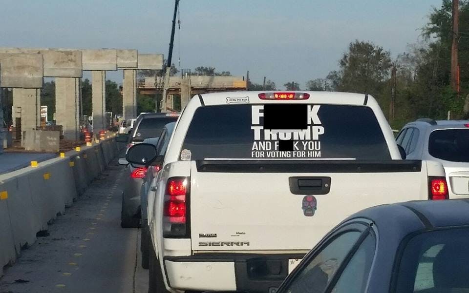 "F Trump and F you for voting for him" car window decal. 