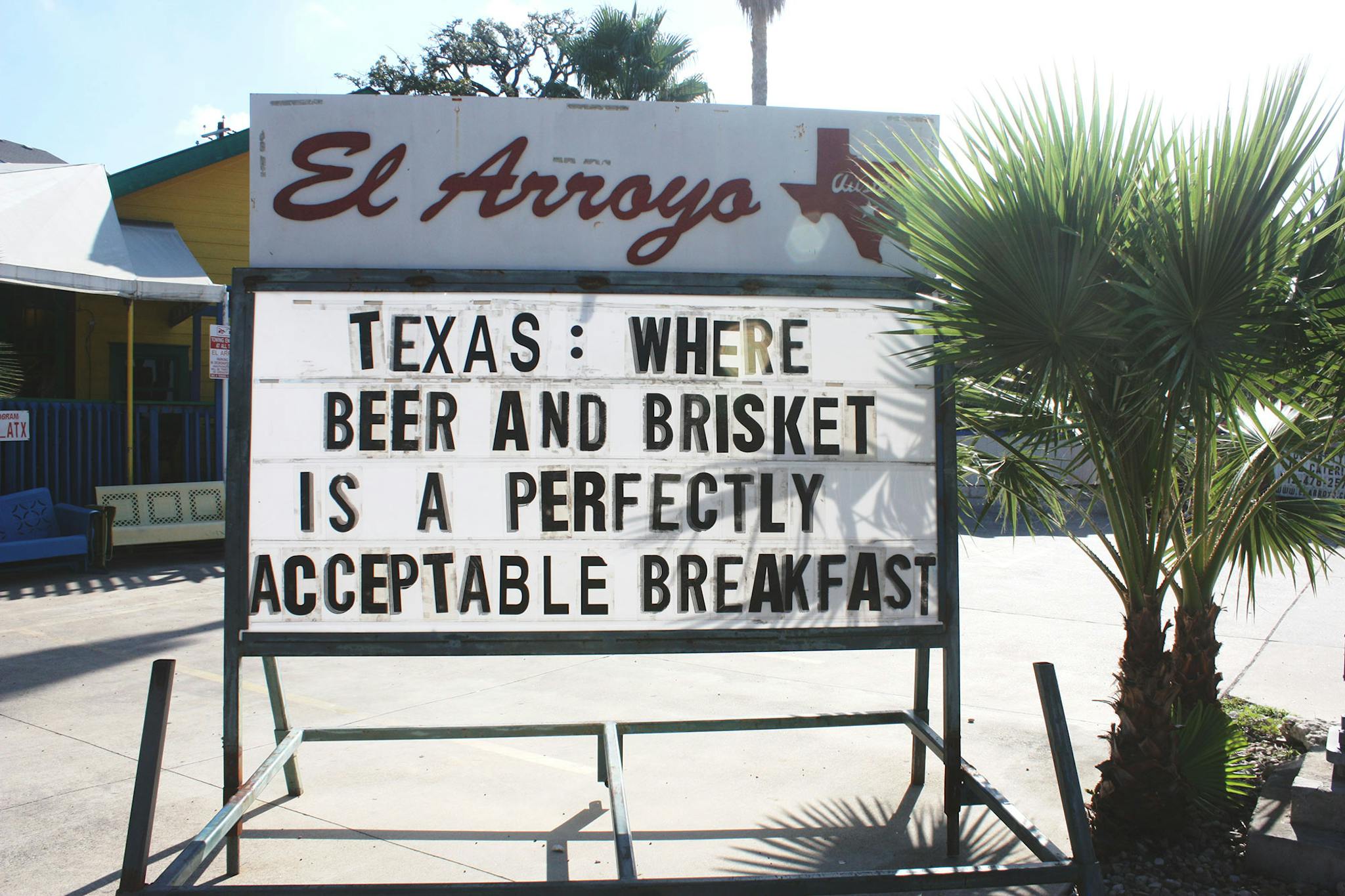 El Arroyo Sign says Texas: Where beer and brisket is a perfectly acceptable breakfast.