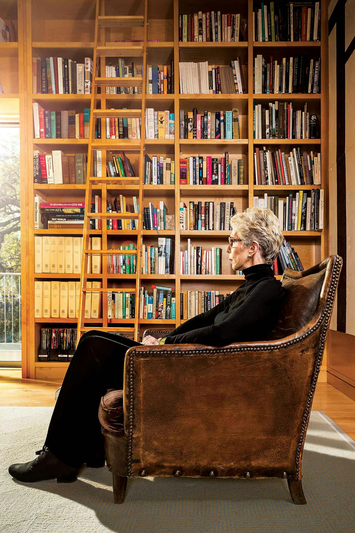 Melba Whatley in her home library in Austin