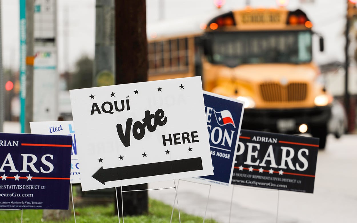 Signs mark a polling site as early voting begins, Tuesday, Feb. 20, 2018, in San Antonio. Early voting in Texas runs though March 2, 2018.