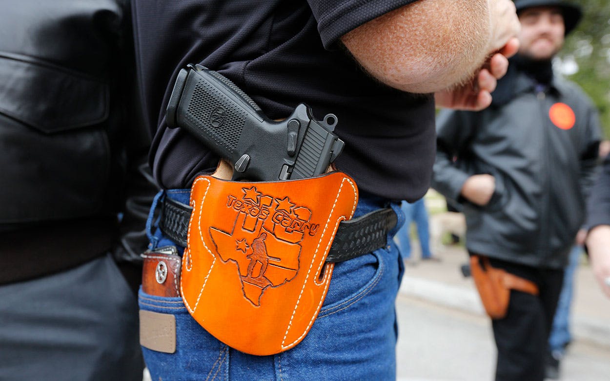 Man carrying pistol at open-carry rally
