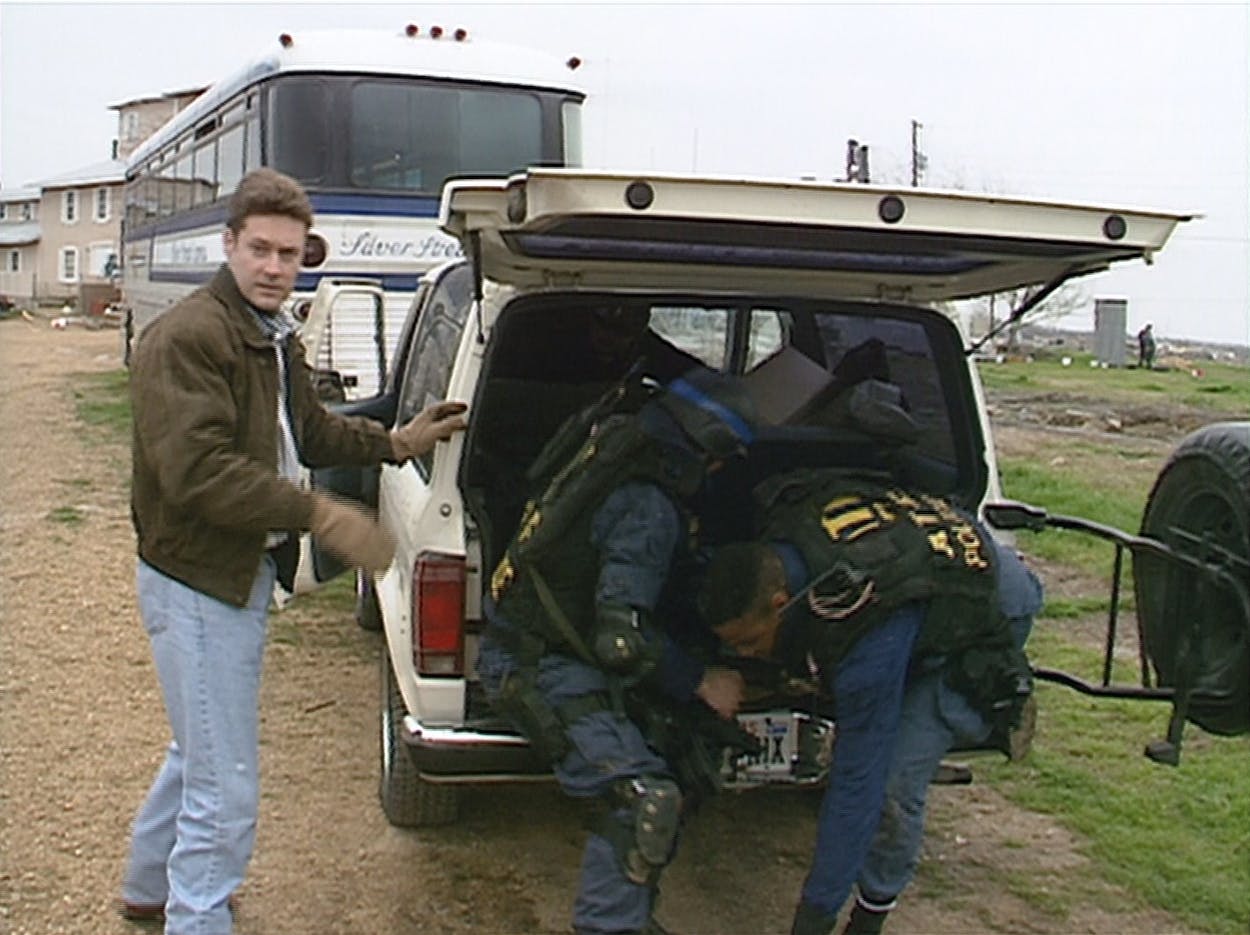 KWTX reporter John McLemore (far left) arrived at Mount Carmel on February 28, 1993, expecting to cover a routine seizure of illegal weapons.