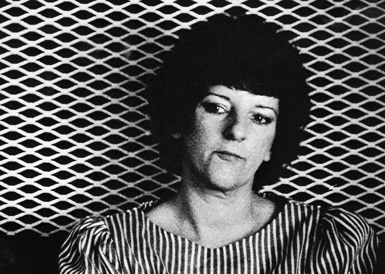 Black and white headshot of a stern-looking Genene Jones