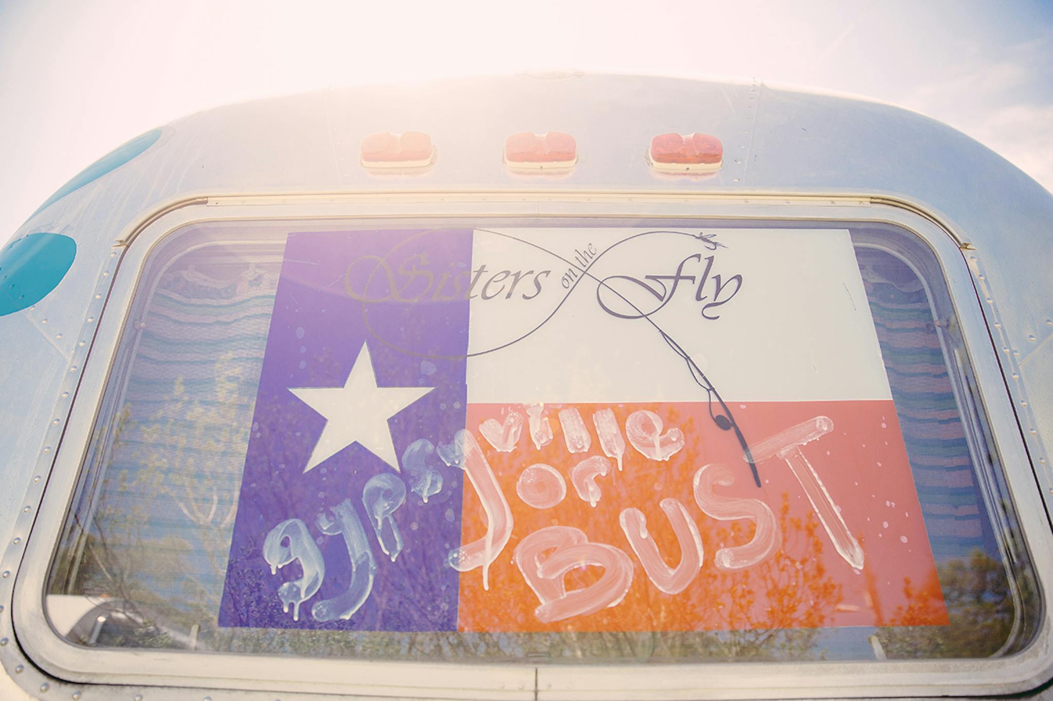 Texas flag that says Gypsyville or bust.