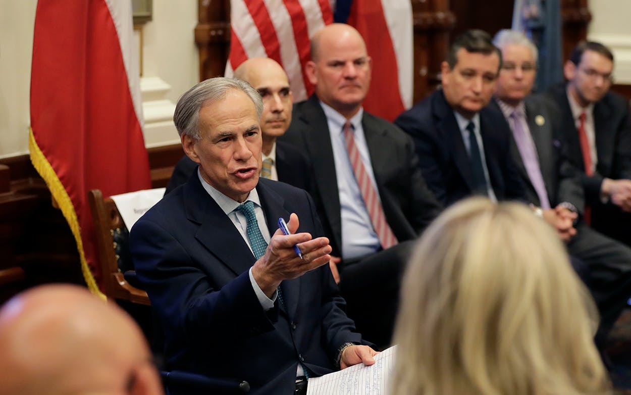 Texas Gov. Gregg Abbott, left, hosts a roundtable discussion in Austin, Thursday, May 24, 2018, to address safety and security at Texas schools in the wake of the shooting at Santa Fe, Texas. Thursday's roundtable included victims, students, families and educators from the Santa Fe, Alpine and Sutherland Springs communities.