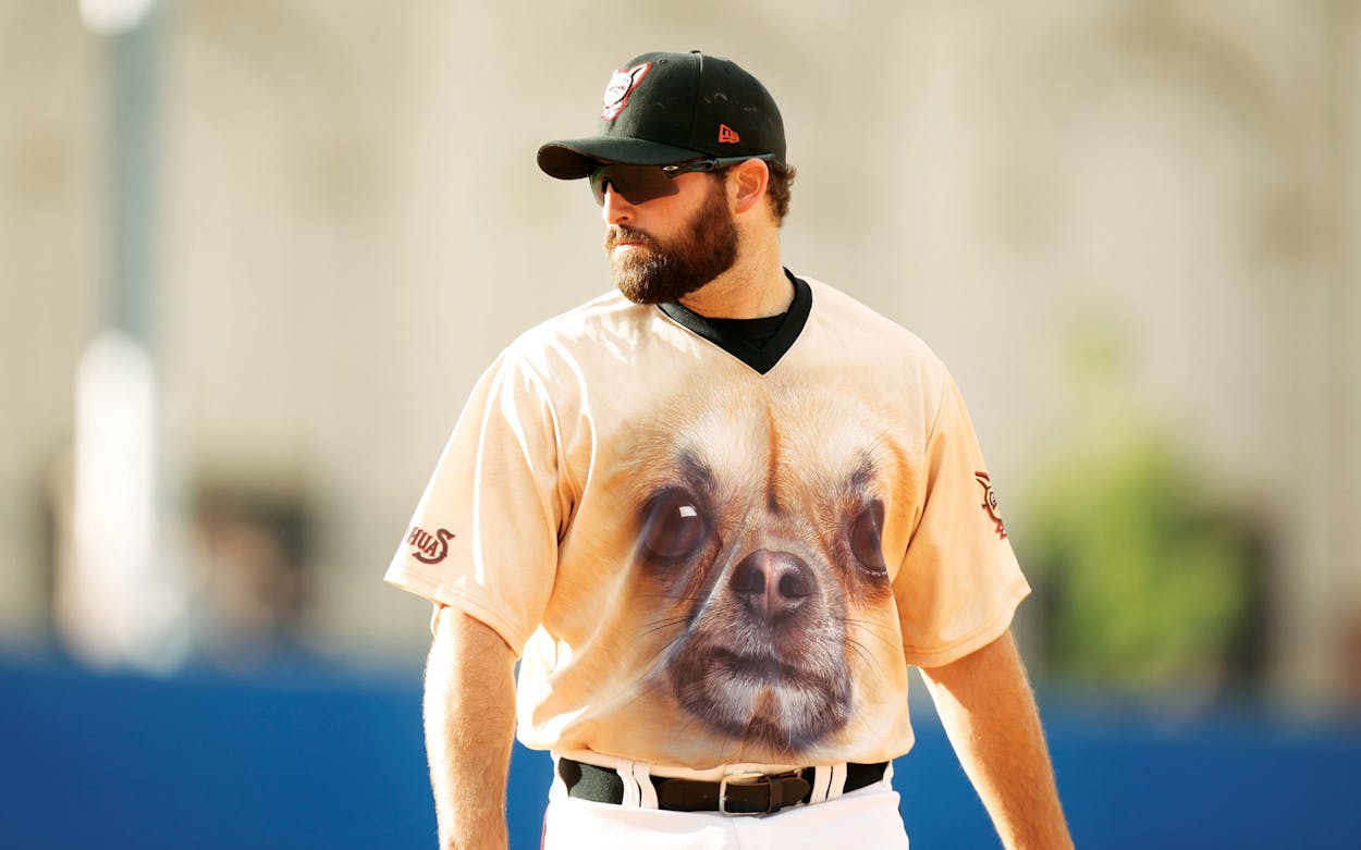Cody Decker wearing a shirt with a large chihuahua's face on it.