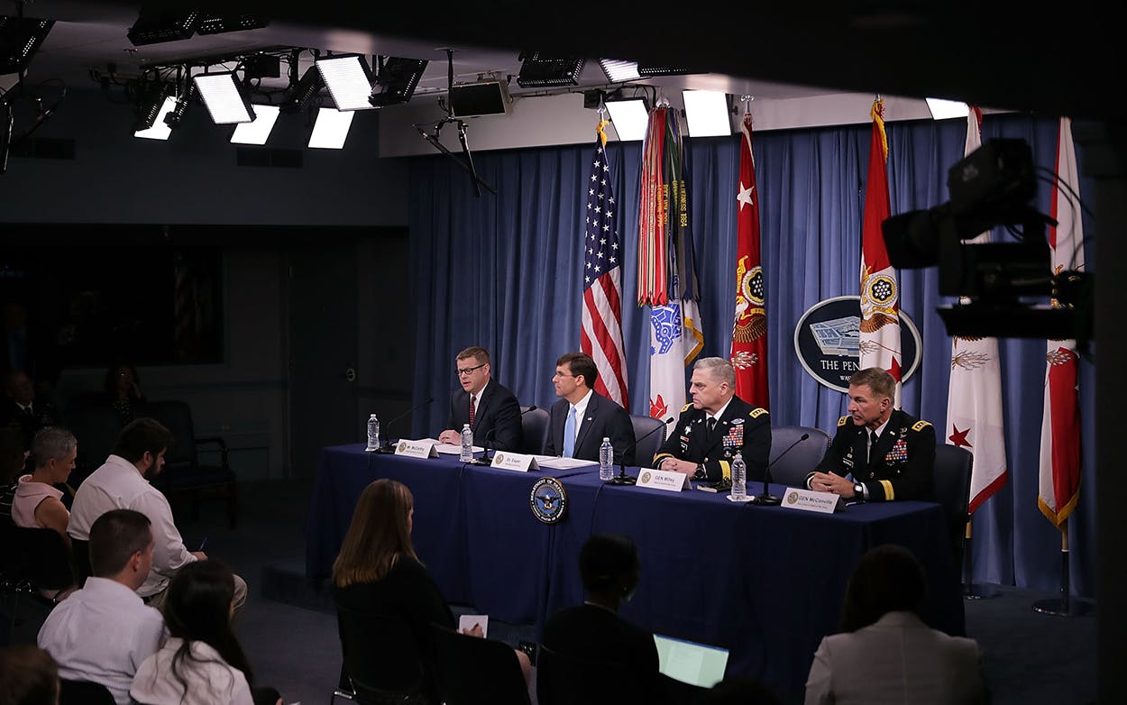Army Undersecretary Ryan McCarthy, U.S. Army Secretary Mark Esper, Army Chief of Staff Gen. Mark Milley and Army Vice Chief of Staff Gen. James McConville announce that Austin will be the new headquarters for the Army Futures Command during a news conference at the Pentagon July 13, 2018 in Arlington, Virginia.