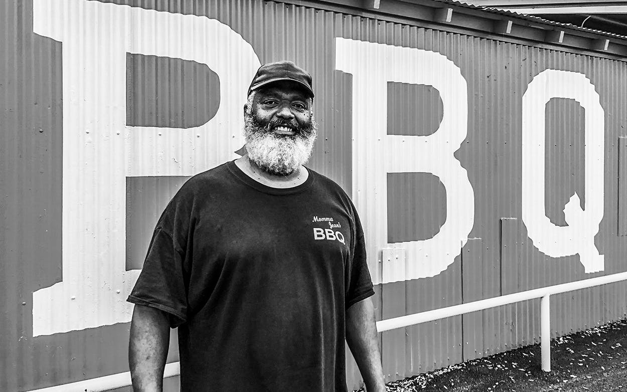 Pitmaster Johnny Walker in front of Momma Jean's BBQ in Lampasas.