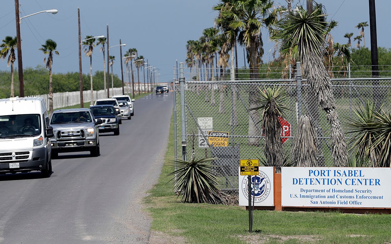 Vehicles leave the Port Isabel Detention Center, which holds detainees of the U.S. Immigration and Customs Enforcement, Tuesday, June 26, 2018, in Los Fresnos, Texas.