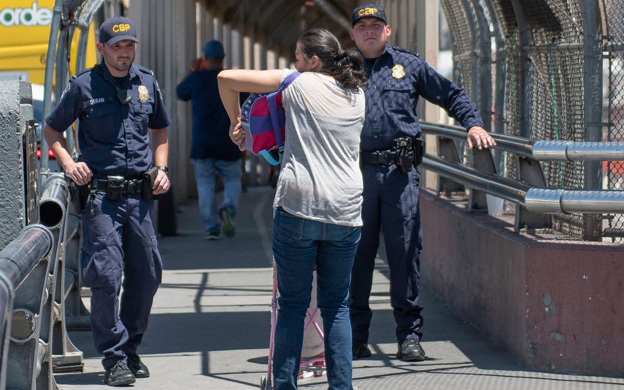 Customs and Border Protection agents question people at the International bridge Tuesday, June 19, 2018 in El Paso.