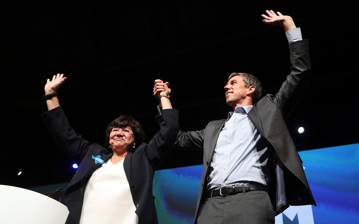 Lupe Valdez and Beto O'Rourke raise their hands as they are cheered at the end of the general session at the Texas Democratic Convention Friday, June 22, 2018, in Fort Worth.