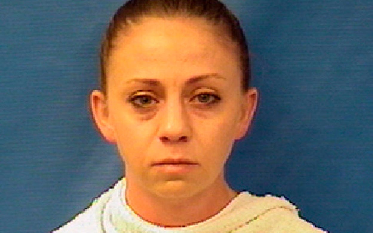 Amber Renee Guyger, a Dallas police officer, was arrested on September 9, 2018, on a manslaughter warrant in the shooting of a black man at his home, Texas authorities said.