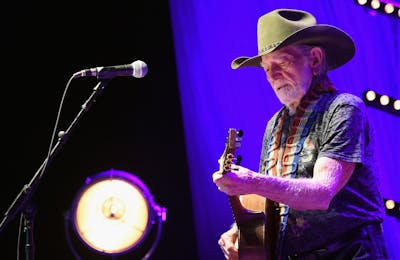 Willie Nelson performs at The Life & Songs of Kris Kristofferson produced by Blackbird Presents at Bridgestone Arena on March 16, 2016 in Nashville, Tennessee.