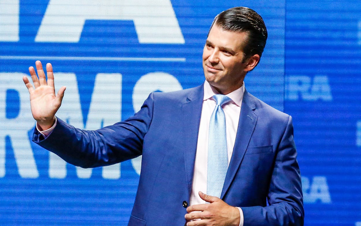 In this May 4, 2018, file photo, Donald Trump Jr. waves from the stage at the National Rifle Association in Dallas.