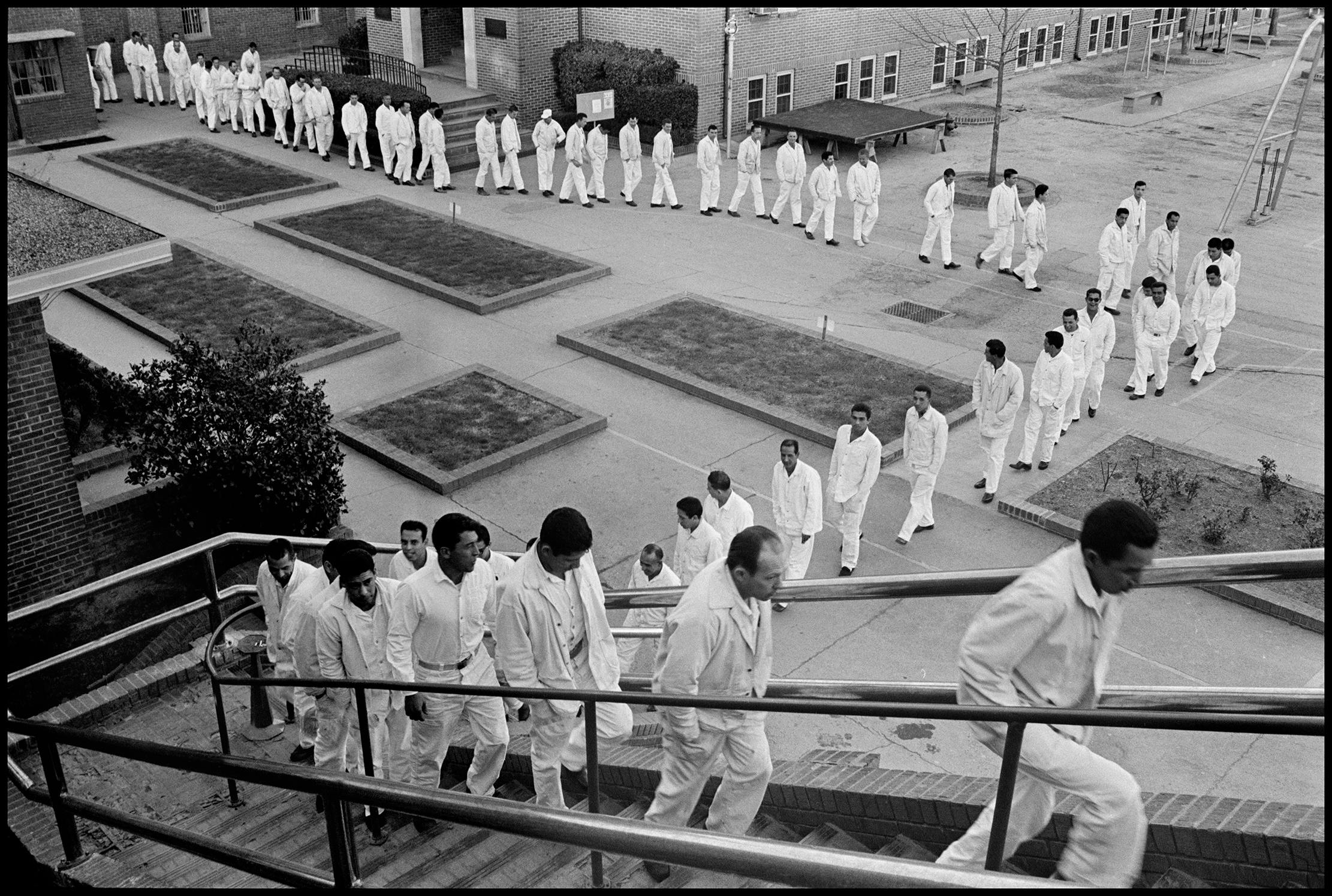 The meal line at The Walls, a walled penitentiary located near the center of the town of Huntsville, in 1968.