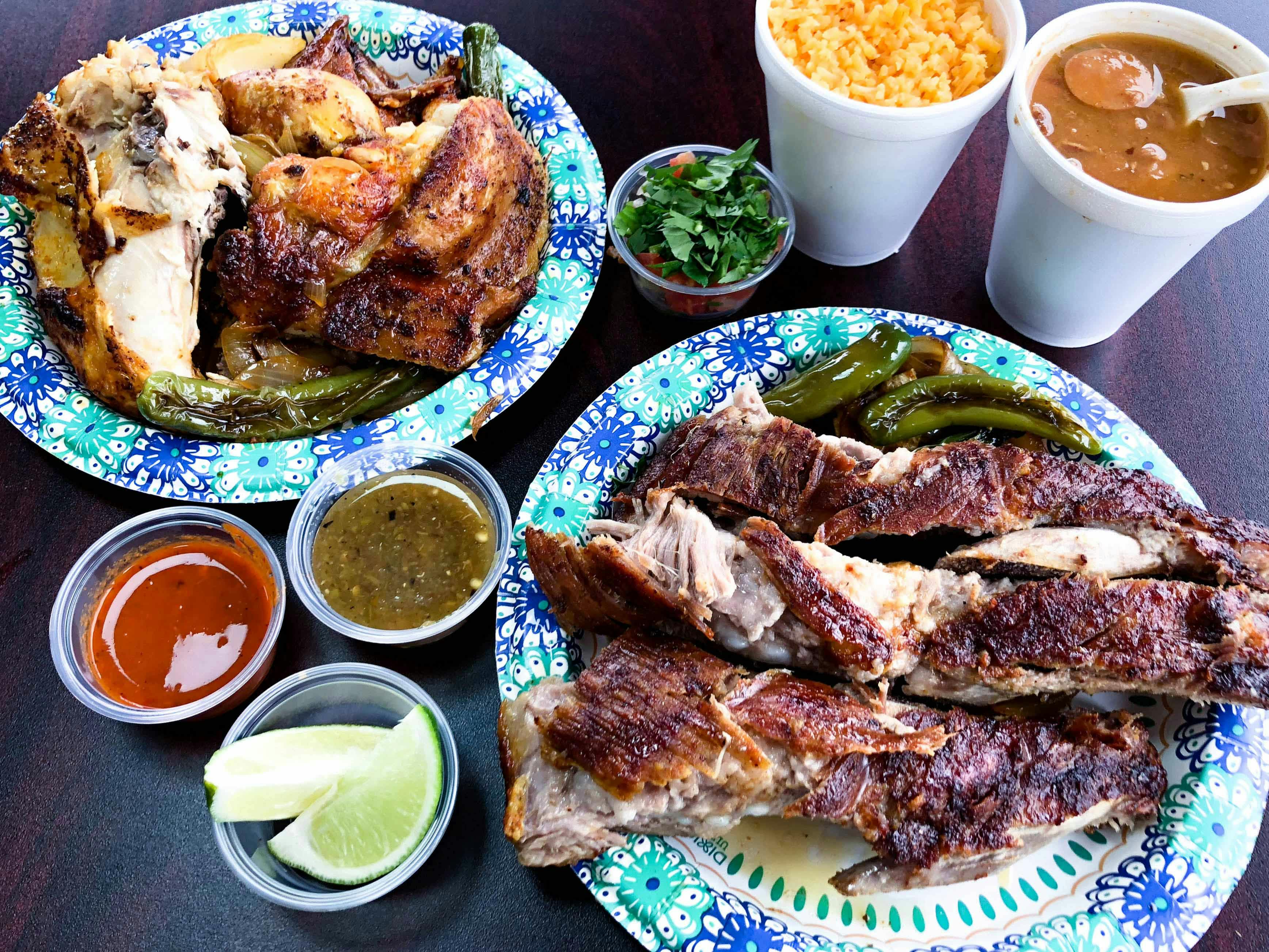 Plates of meals from Pollos La Pullitas
