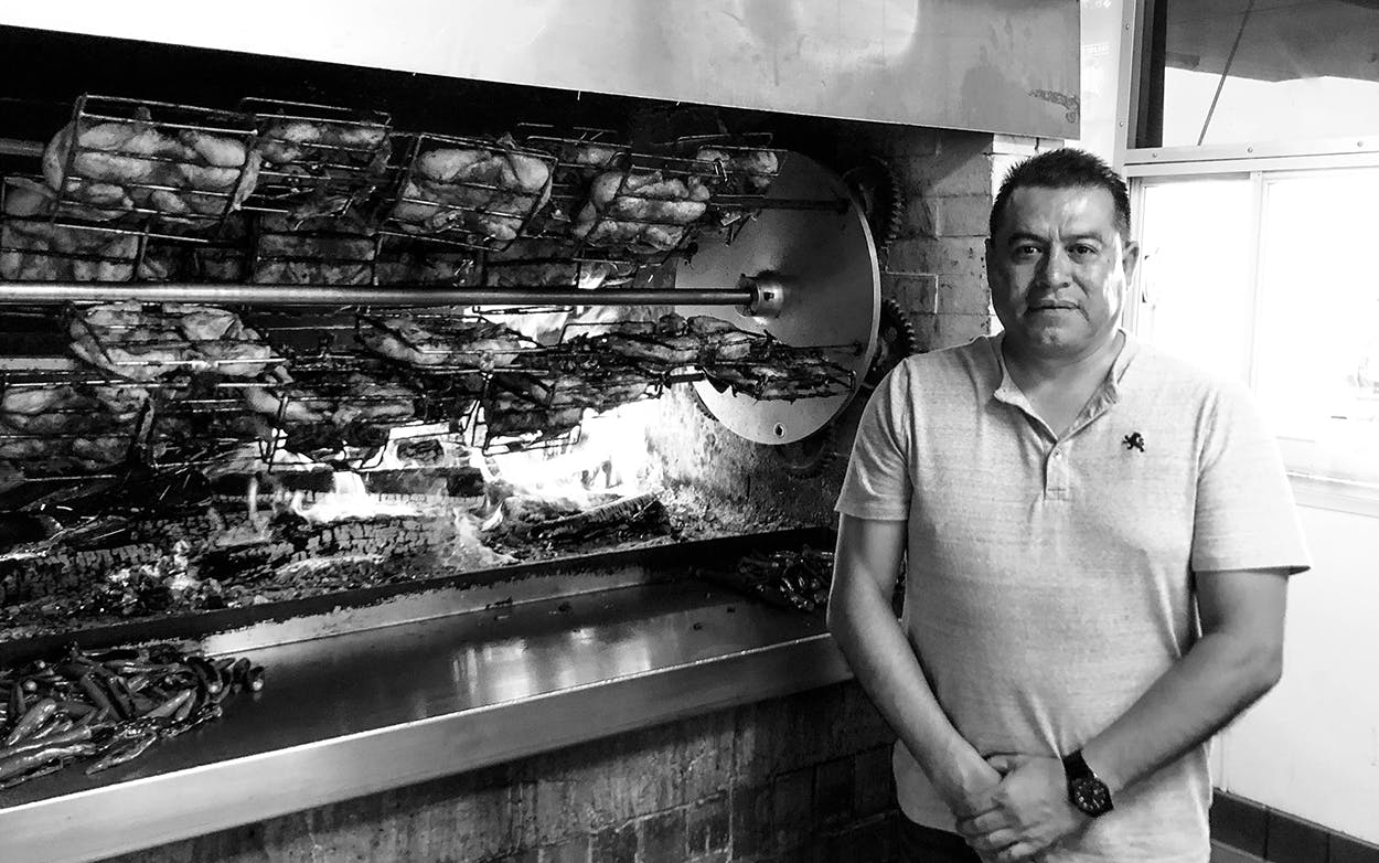 Jose Vega in front of the rotisserie at the Arlington location of Pollos la Pullita