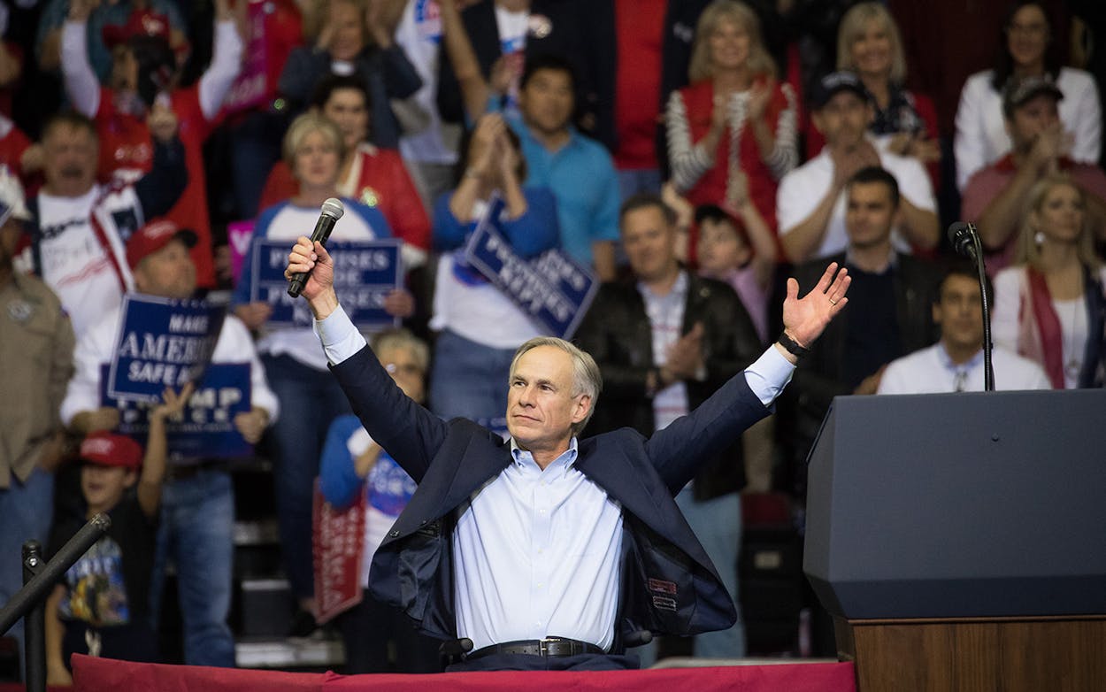 Governor Greg Abbott of Texas addresses the crowd before President Donald Trump took the stage for a rally in support of Sen. Ted Cruz (R-TX) on October 22, 2018 at the Toyota Center in Houston.