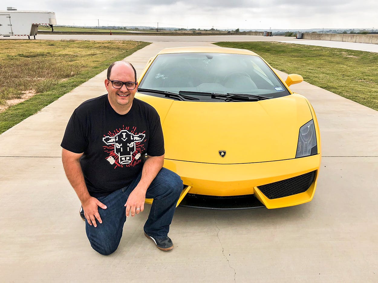 Barbecue Editor Daniel Vaughn with a Lamborghini