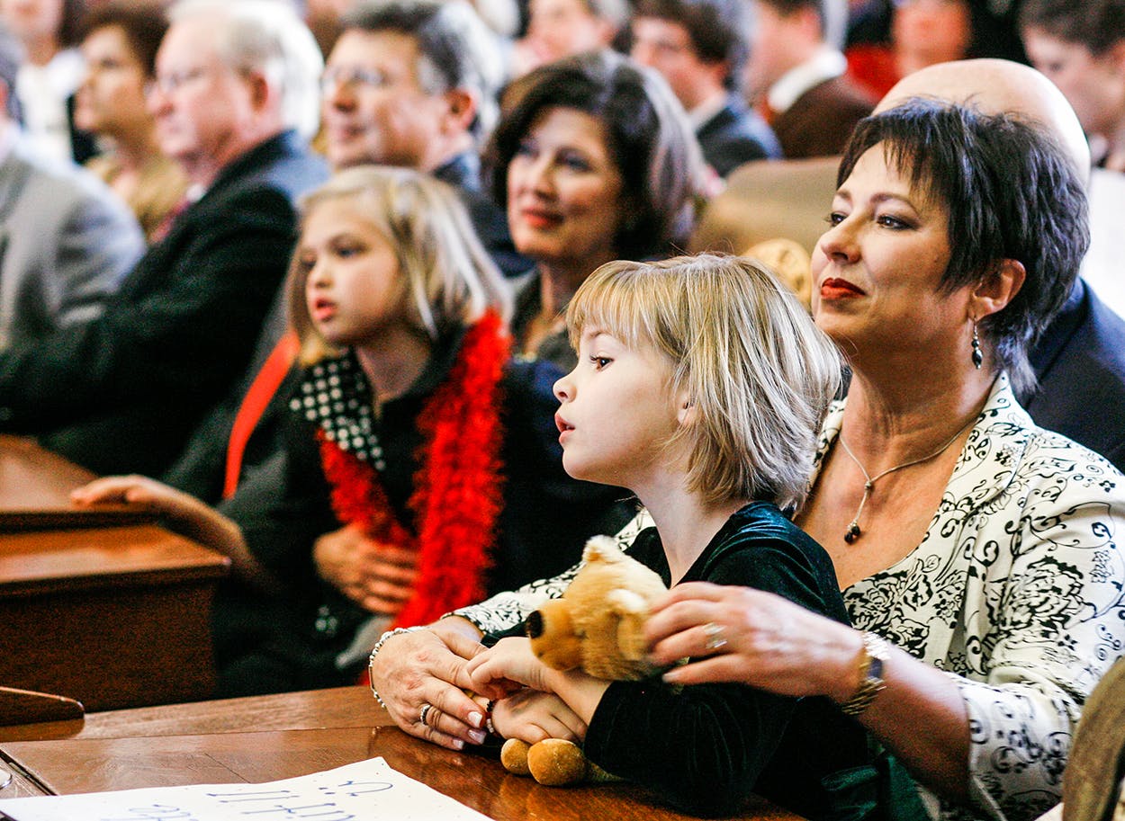 Rep. Vicki Truitt, R-Keller, foreground, holds her granddaughter, Sidney Jones, during one of the speeches at the beginning of the 81st session of the Texas Legislature Tuesday, Jan. 13, 2009, in Austin.