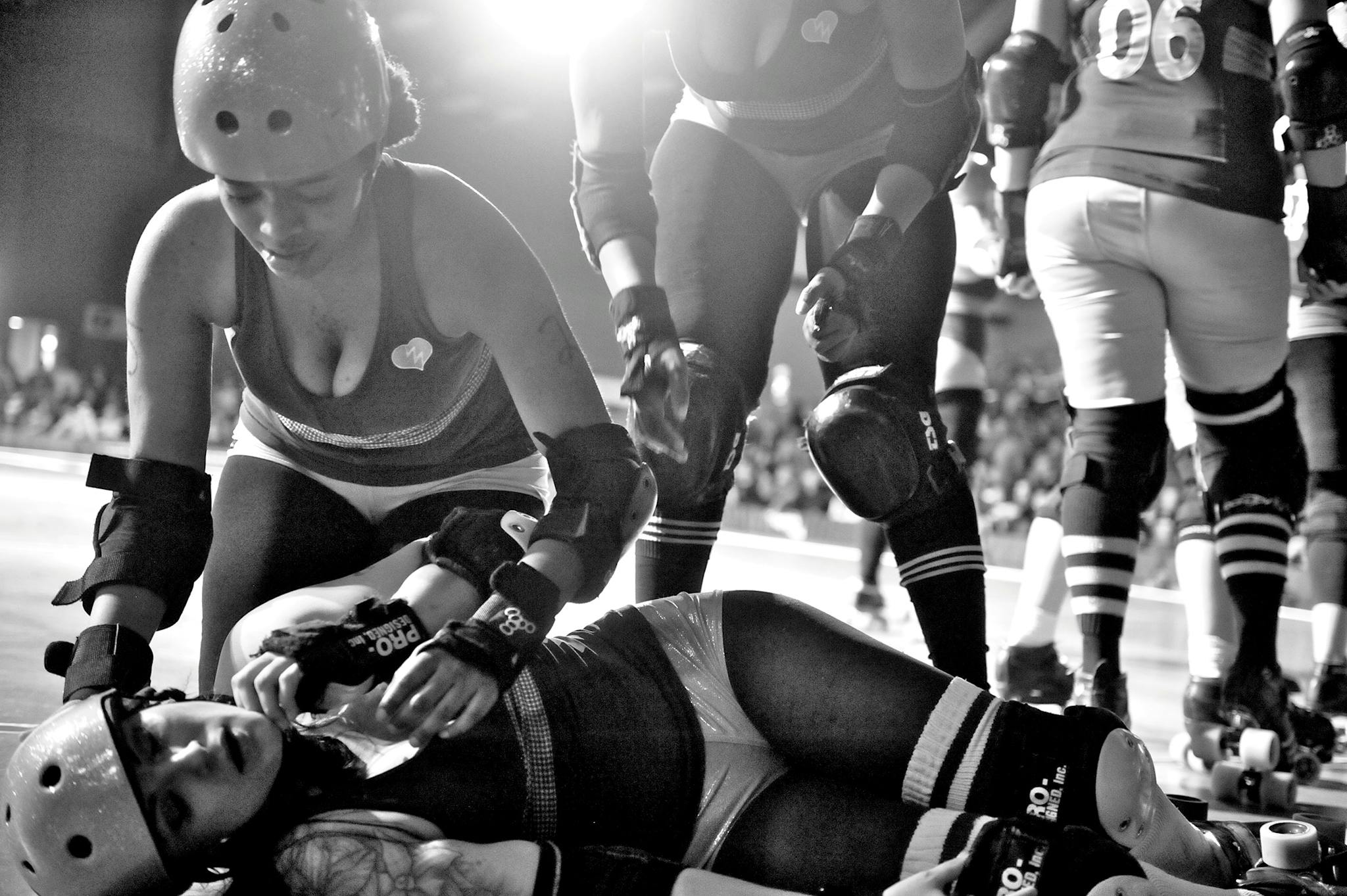 Ruby Wring and Rita Menweep at a roller derby track.