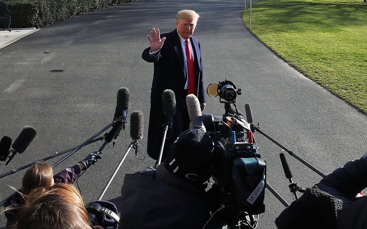 President Donald Trump speaks to the media before boarding Marine One to depart from the White House on December 7, 2018 in Washington, DC.