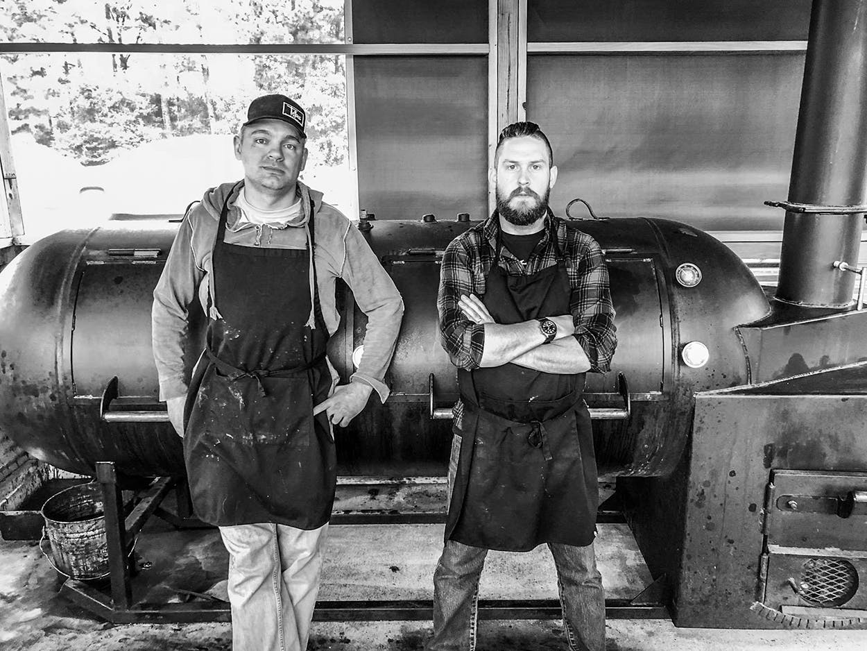 BBQ News Michael Michna (left) and James McFarland in front of their Evie Mae's smoker