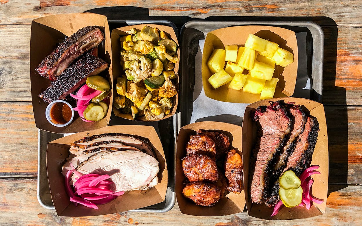 Spicy pickled pineapple stands out on this barbecue platter from Whitfield's