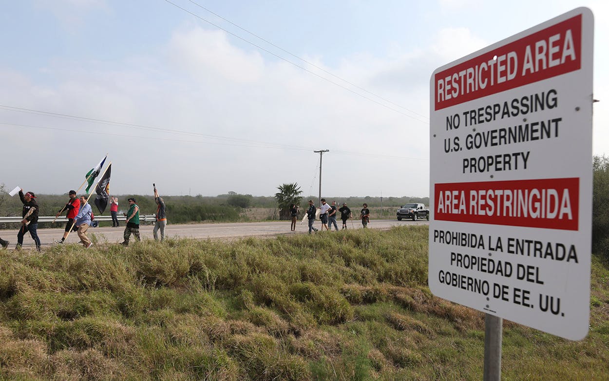 Members of the Carrizo/Comecrudo Tribe along with other opponents of wall construction convened near the river and made their way about 3 miles down to the National Butterfly Center to march in protest on Monday, Feb.4, 2019 in Mission, Texas.