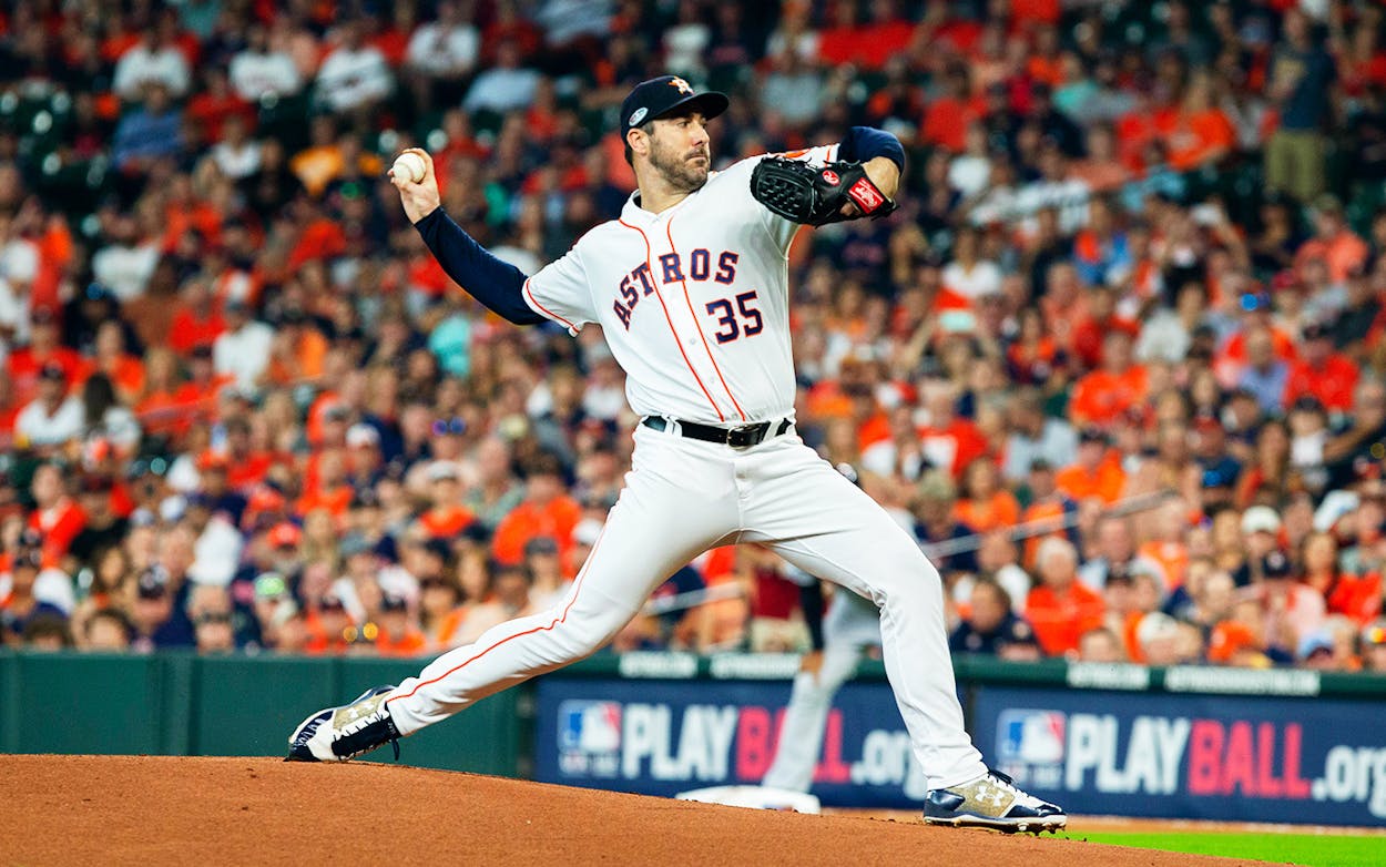 Houston Astros starting pitcher Justin Verlander delivers the pitch in the first inning of game 1 of the ALDS between the Houston Astros and the Cleveland Indians at Minute Maid Park in Houston on October 5, 2018.