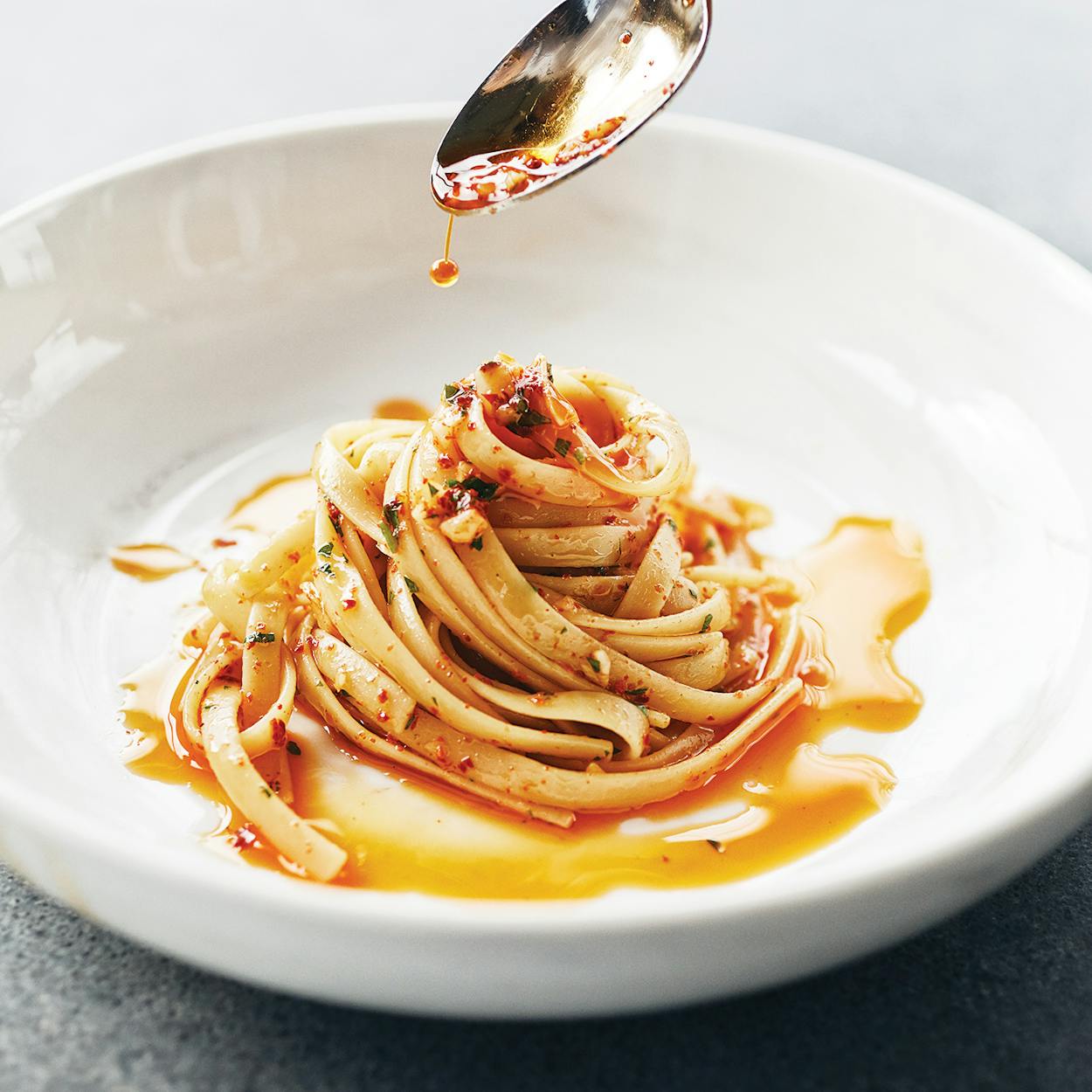 Tagliatelle with red pepper flakes in Texas olive oil.