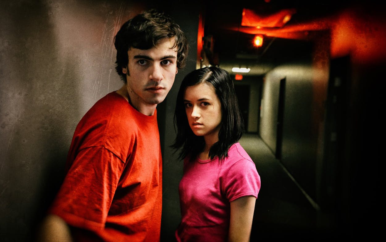 Roby Attal and Lauren Hatfield in a scene from Robert Rodriguez’s Red 11.