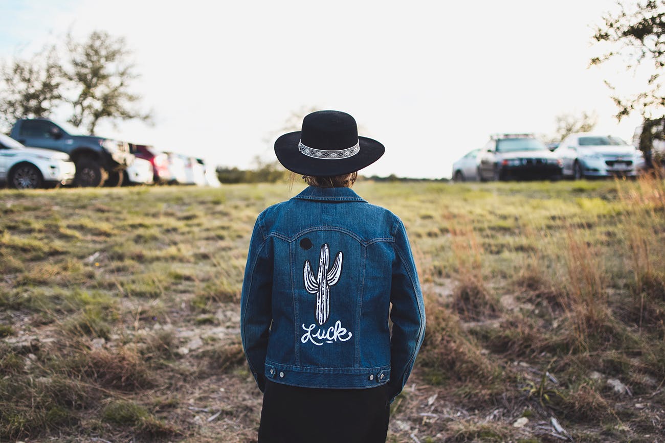 A denim jacket hand-painted by artist Emily Miller at Willie Nelson's Luck Reunion.