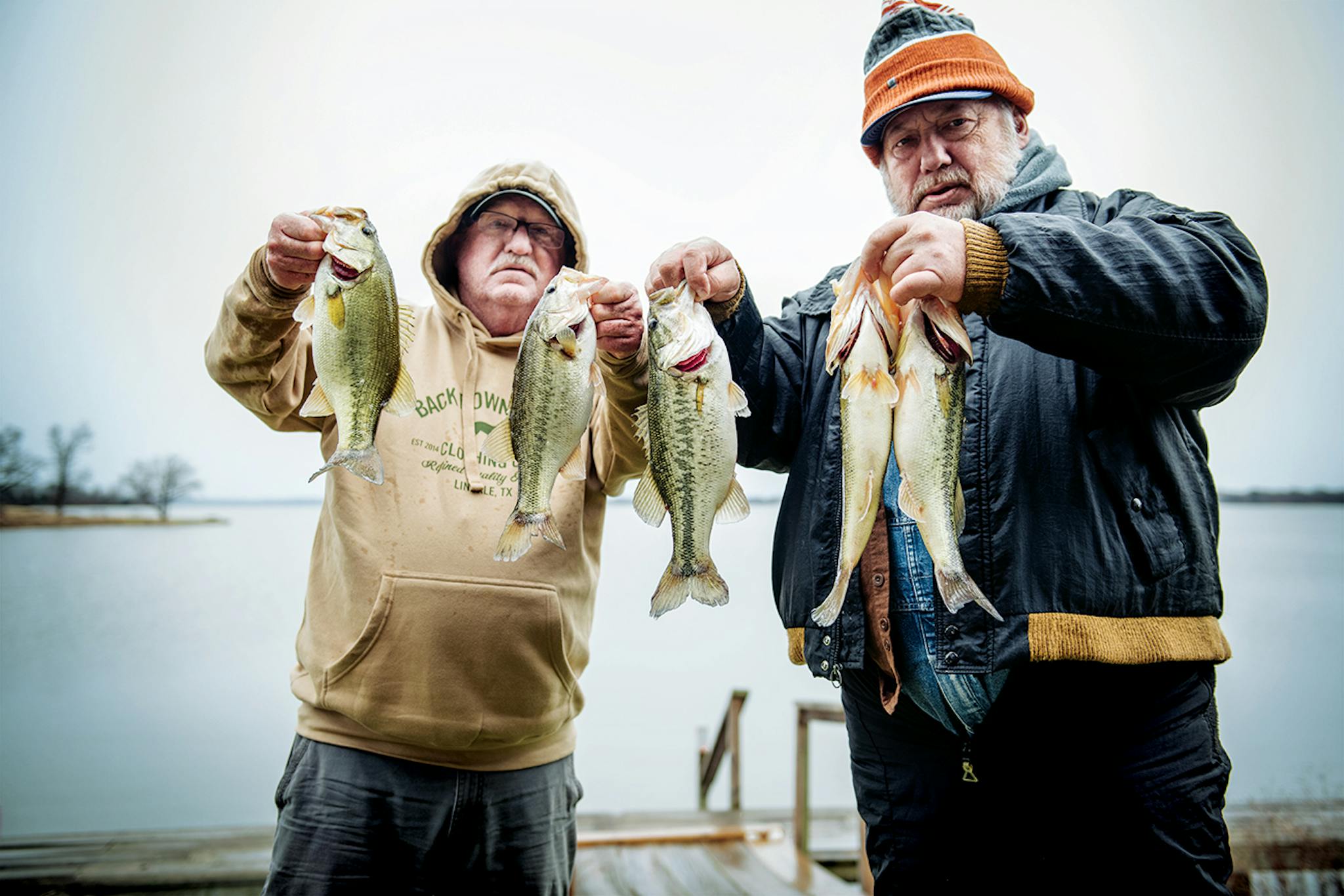 Glen Irwin, 71, of Quitman, and Louie Pope, 61, of Gilmer, hold up their catches of the day.