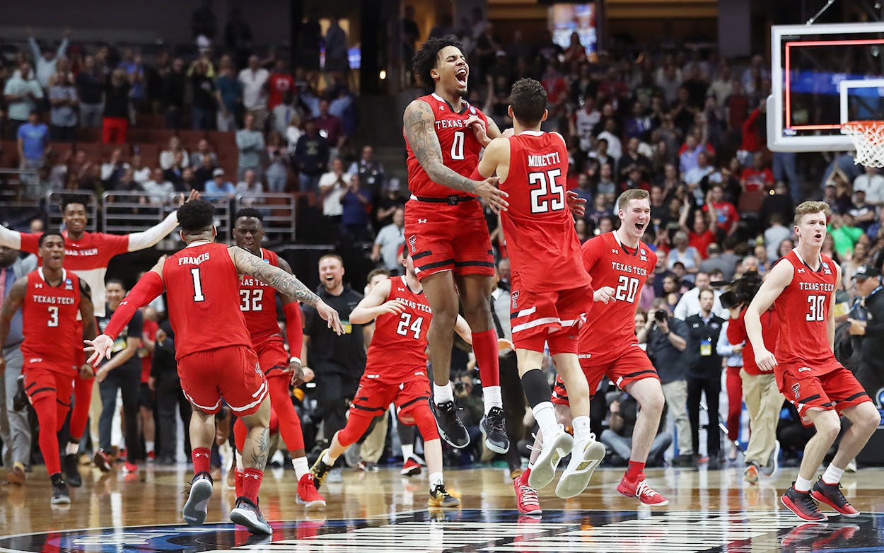 The Texas Tech Red Raiders celebrate their victory against the Gonzaga Bulldogs during the 2019 NCAA Men's Basketball Tournament West Regional on March 30, 2019 in Anaheim, California.