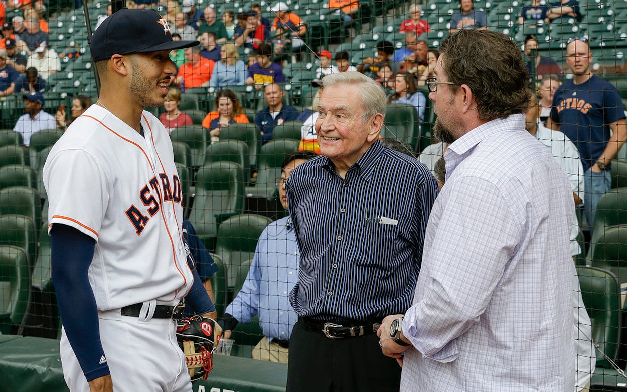 Dave Ward, center, talks with Houston Astros shortstop Carlos Correa #1 and former Houston Astro Jeff Bagwell before throwing out the first pitch at Minute Maid Park on May 9, 2017 in Houston.