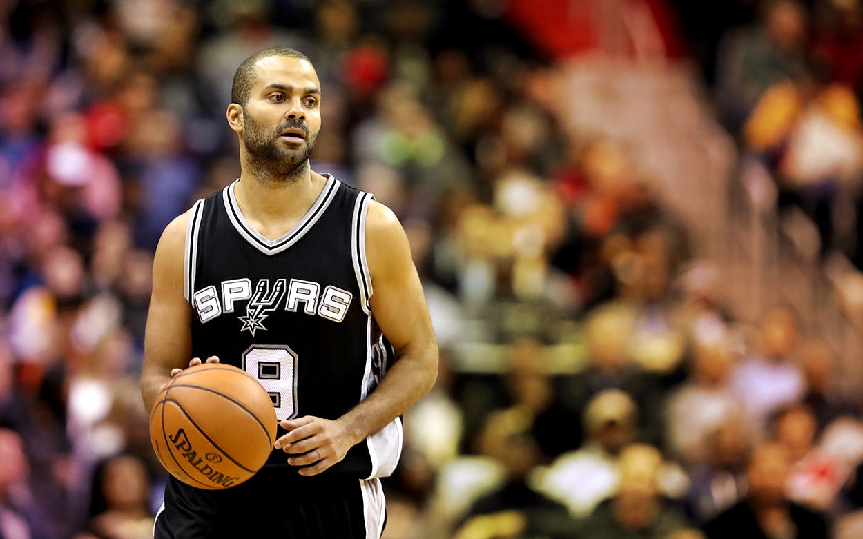 action shot of Tony Parker playing for the San Antonio Spurs.